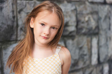 Close up portrait of a cute little girl of 7-8 years old