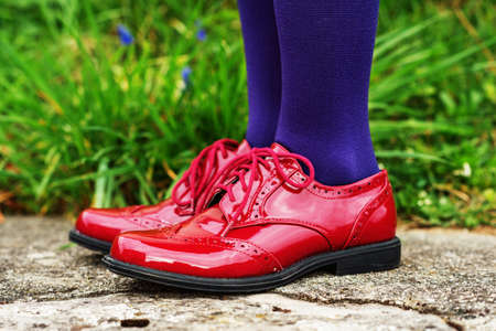 Fashion shoes on kid's feetの写真素材