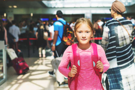 Little girl in airport or train stationの写真素材
