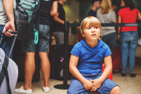 Little boy in airport or train stationの写真素材
