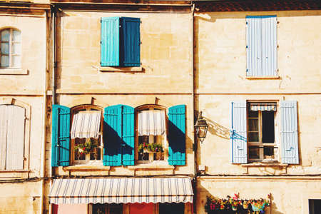 Old facade with colorful shutters on the streets of Provence, Franceの写真素材