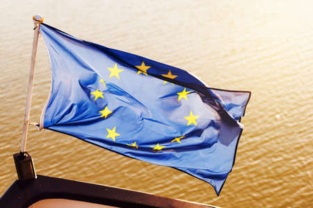 EU flag in front of a boatの写真素材