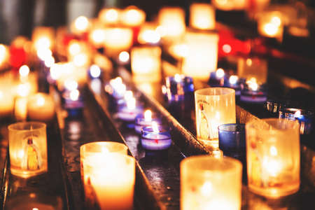 Candles in the Church of the Saintes Maries de la Mer. Selective focusのeditorial素材