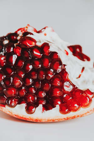 Close up image of pomegrenate on white backgroundの写真素材