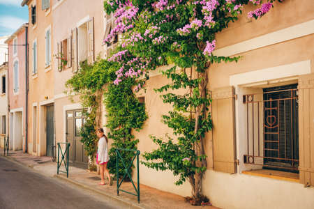 Cute little kid girl on summer vacation in Camargue, France