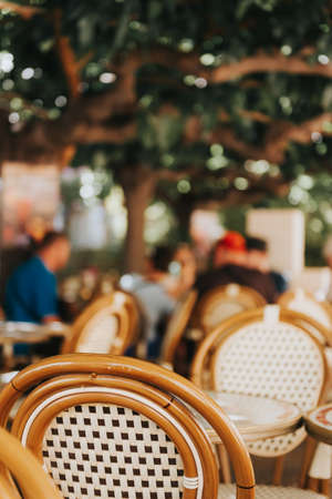 Empty coffee terrace with tables and chairs on South of France