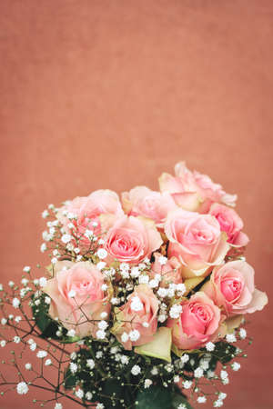 Vertical image of tender pink roses with copy spaceの写真素材