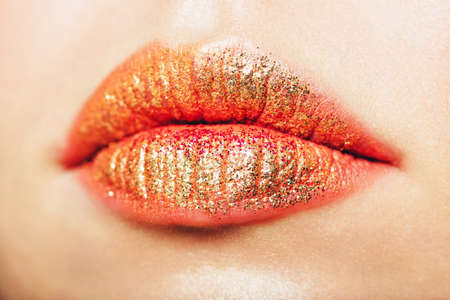 Close up image of glitter lips, brown golden tonesの写真素材