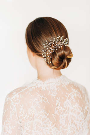 Trendy bridal hairstyle with beautiful wedding accessoiresの写真素材