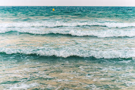 Natural background with sea waves, summer travel conceptの写真素材