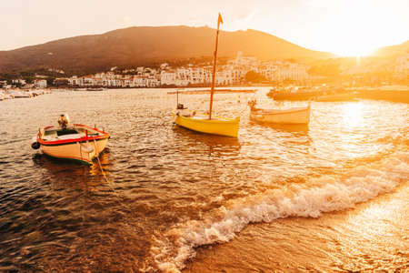 Fishing boats in sunset light, Cadaques, Costa Brava, Spainの写真素材