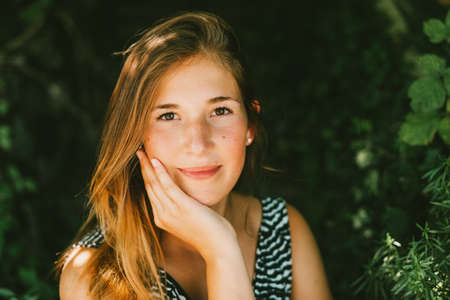 Close up summer portrait of young beautiful girl の写真素材