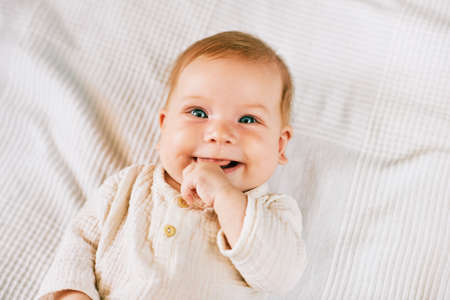 Portrait of sweet happy 3-6 months old babyの写真素材