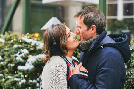 Outdoor portrait of happy middle age couple on a nice winter dayの写真素材