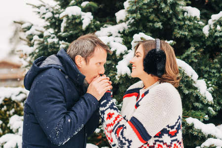 Outdoor portrait of happy middle age couple on a nice winter dayの写真素材