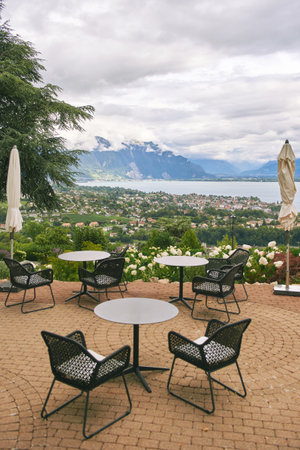 Cozy terrace with an amazing view of lake Geneva and Vevey city, Switzerlandの写真素材