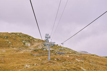 Mountain landscape with chairlift, image taken in Bellwald, Valais, Switzerlandの写真素材