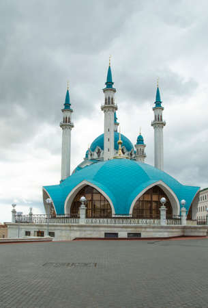 Beautiful white mosque with a blue roof against the sky with clouds. Mosque in Russia in Kazanの写真素材
