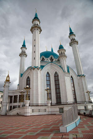 Beautiful white mosque with a blue roof against the sky with clouds. Mosque in Russia in Kazanの写真素材