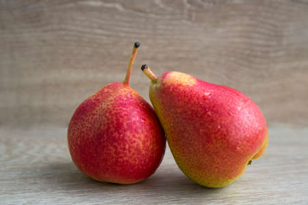 Fruits are ripe pears. Bio healthy food. Two red pears. Still-life.の写真素材