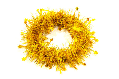 Christmas Golden garland in the form of a wreath and a circle on a white background. Christmas decorationの写真素材