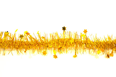 Christmas Golden garland in the form of a wreath and a circle on a white background. Christmas decorationの写真素材