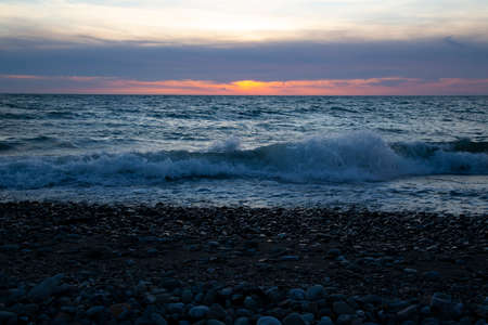 Beautiful sunset above the sea The setting sun over the ocean, in the eveningの写真素材