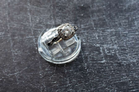 Diamond Ring, Gold ring with natural diamonds on a dark background, precious stonesの写真素材