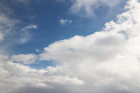 Sunny sky abstract background, beautiful cloudscape, on the heaven, view over white fluffy clouds,...
