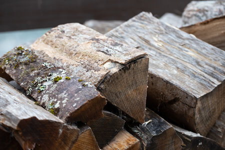 Wood. Fire Wood. Cut Fire wood for sale. Firewood cut and piled high for sale. Wood is used for Fires in Fireplaces and Camp Fires.の写真素材