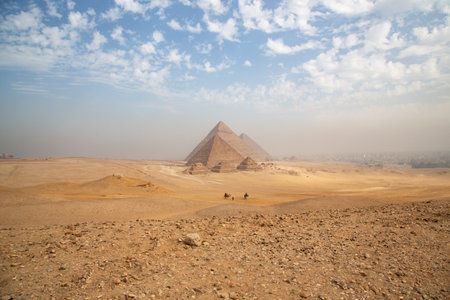 Egypt. Cairo - Giza. General view of pyramids from the Giza Plateau (three pyramids known as Queens' Pyramids on front sideの写真素材