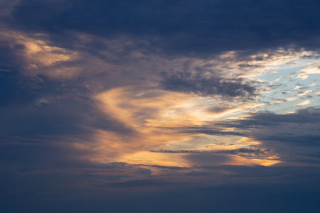 Beautiful colorful dramatic sky with clouds at sunset or sunrise.