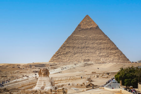 The Sphinx and Pyramid against the background of a beautiful blue sky ,Cairo,Giza, Egypt