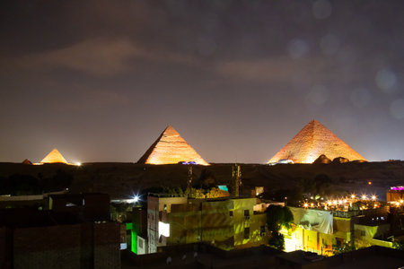 The Great Pyramid complex enlighted at night, Giza, Egypt