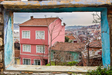 House through the window frame without a glassの写真素材