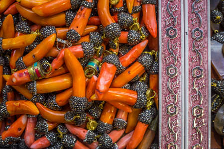 Red chilly peppers jewellery decorative beads, Grand Bazaar, Istanbul, Turkeyの写真素材