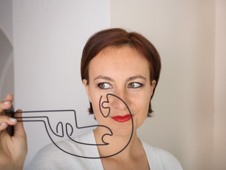 facial portrait of a woman of 35 - 40, mysterious in search of a solution. indecision, reflection, doubt. Looking awayの写真素材