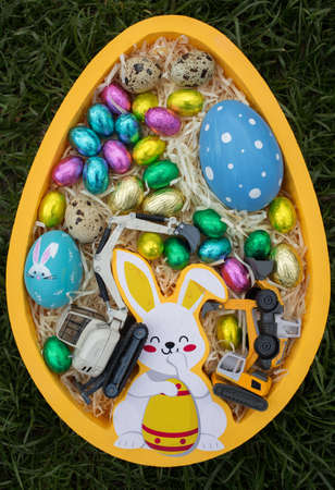 Symbolic Easter gift for construction companies. A collection of various colored and chocolate...