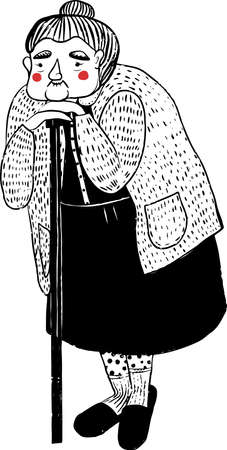Cute elderly woman in warm sweater and black dress with bent back standing with caneの写真素材