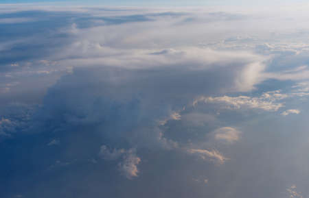 From above it is not so terrible. The stormy clouds shined from above with the sun. View from...