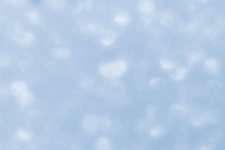 Abstract soft azure background with bokeh. The trending color of 2021. Calm and peaceful natural sky...