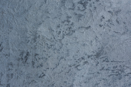 Gray abstract acrylic background. Texture imitation of a dark gray concrete surface. Rough cold...