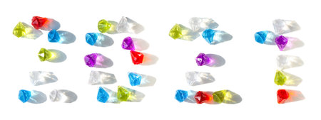 2021 of colored stones on a white background. New Year's bright colorful greeting banner. Happy New...