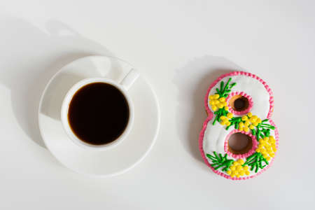 March 8 cake coffee mug on a white background. Sweet gift dessert for Women's Day, Birthday,...