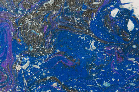 Abstract space blue purple silver black background. Acrylic painting fluid art. Night waves of the...