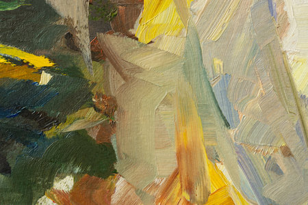 Abstract background autumn painting. Orange brown yellow beige mixed colors of oil paint. A fragment of an artwork in different shades of autumn shades. Modern handmade design with a brush on canvasの写真素材