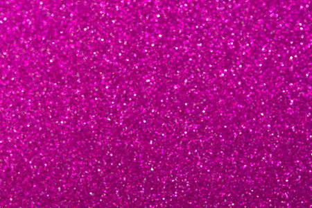 Abstract pink magenta background with unfocused bokeh. Fashionable bright shiny color of femininity, beauty. Festive pure pink layout of a postcard, a New Year banner. Valentine's Day backgroundの写真素材