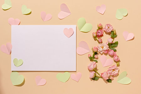 International Women's Day. Flower composition 8. Creative date. Heads of delicate roses on a light pastel beige background. Mockup postcard Mother's Day, March 8. Spring flower background, copy spaceの写真素材