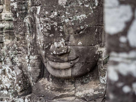 Face sculpture on Bayon temple wallの写真素材