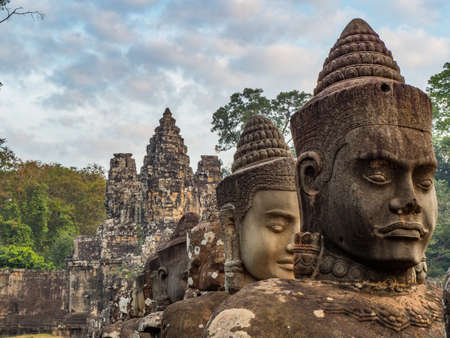 Famous heads between Angkor Wat and Angkor Thum, south gateの写真素材
